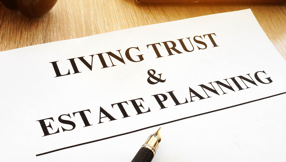 Living trust and estate planning form on a desk.